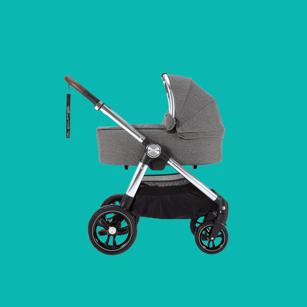 A side angle view of the Ocarro pram with the newborn bassinet.